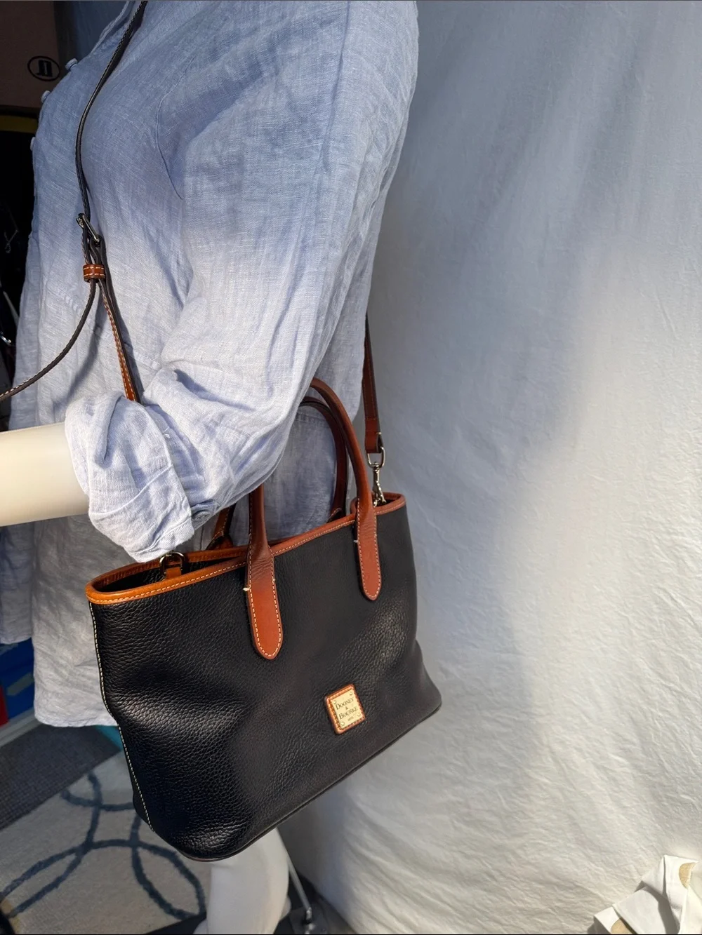 Dooney & Bourke Black Pebbled Leather Tote with Brown Trim & Handles